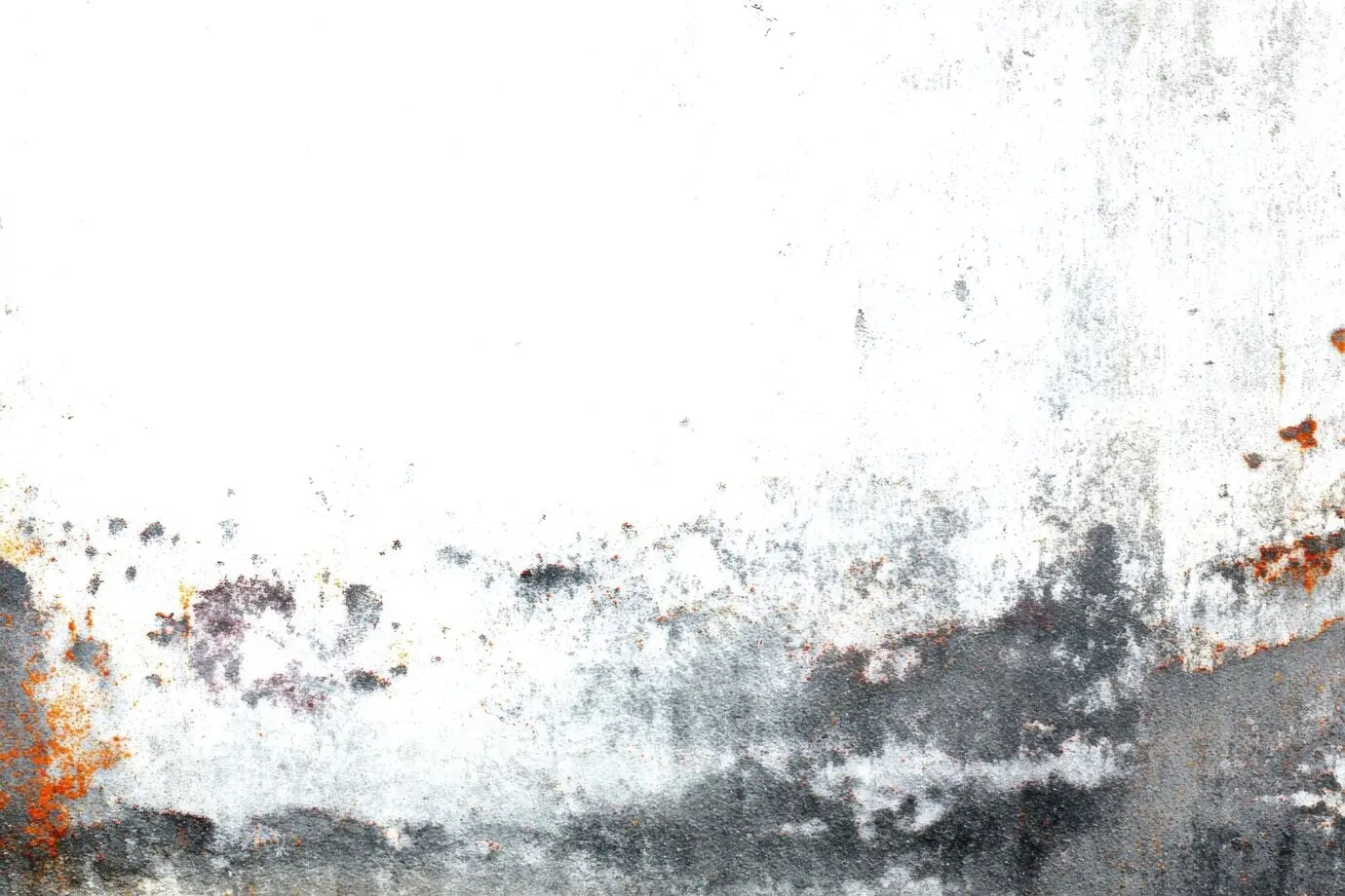 Weathered concrete wall with rust stains and a grungy texture